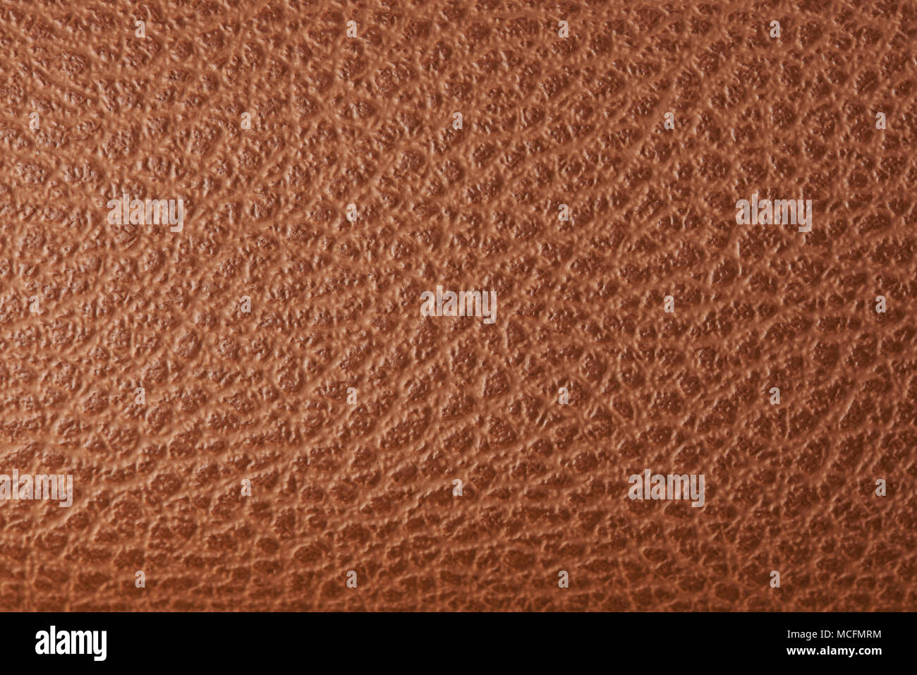 Flat brown leather texture close up. Cow textured skin Stock Photo