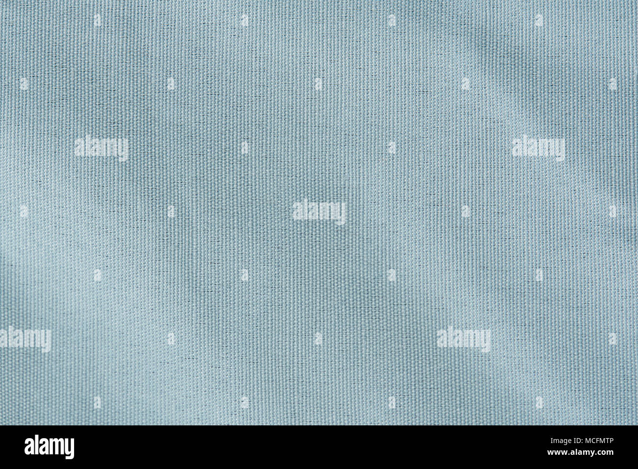 Bright blue fabric texture background. Soft white tablecloth texture Stock Photo