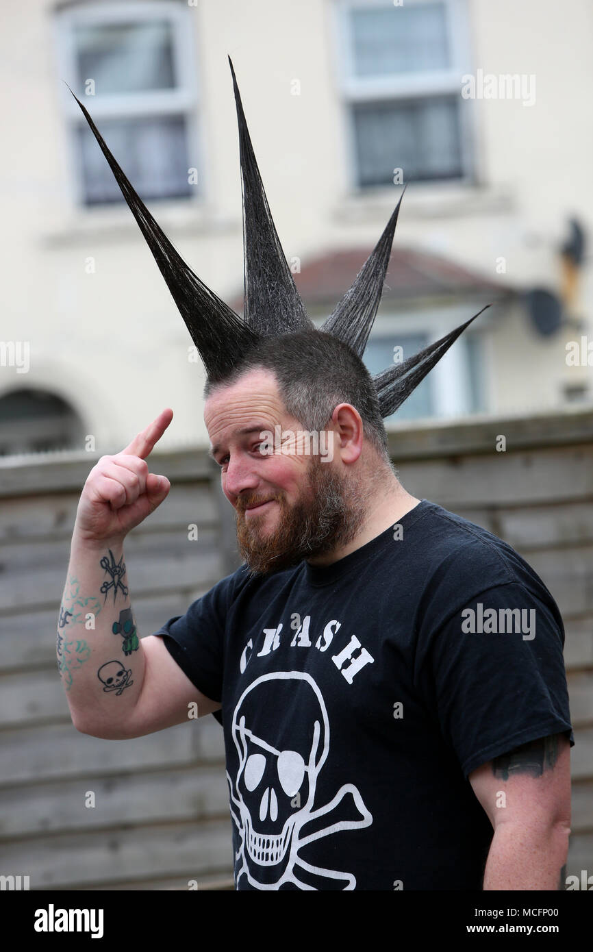 Man with mohawk / mohican hairstyle pictured in Bognor Regis, West Sussex, UK. Stock Photo