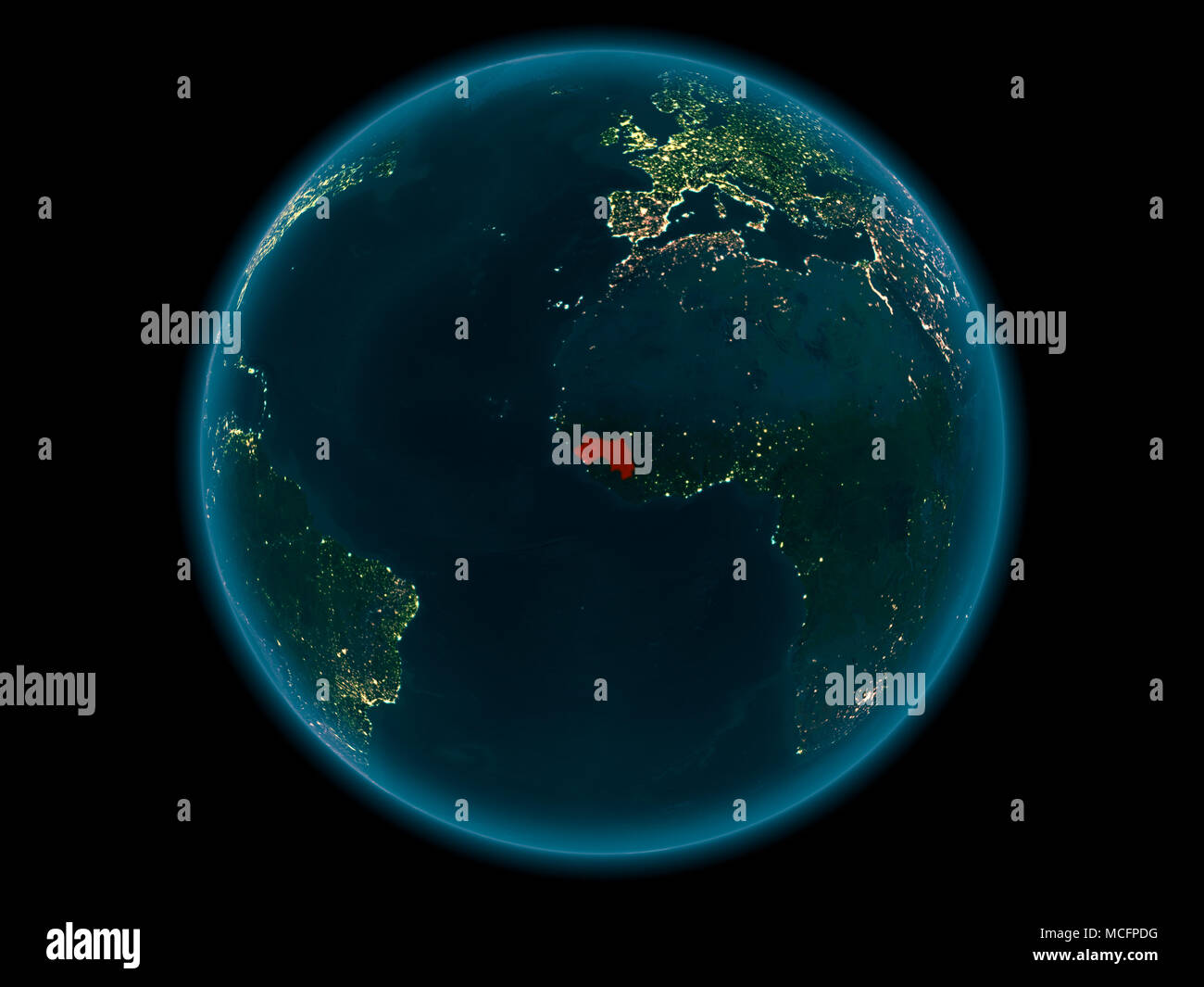 Night above Guinea highlighted in red on model of planet Earth in space ...