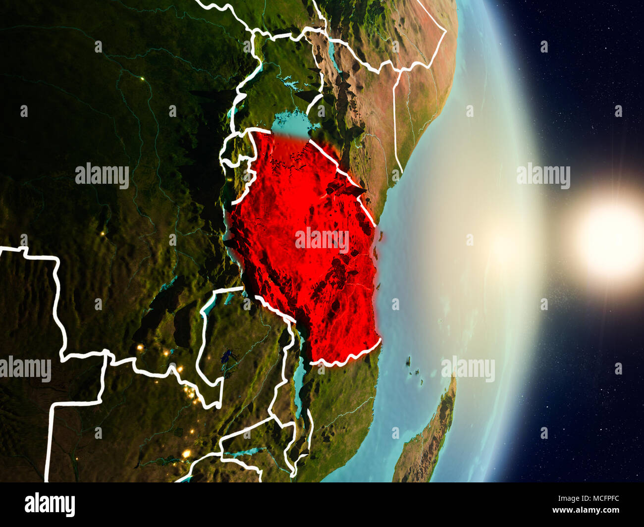Tanzania during sunrise highlighted in red on planet Earth with visible ...