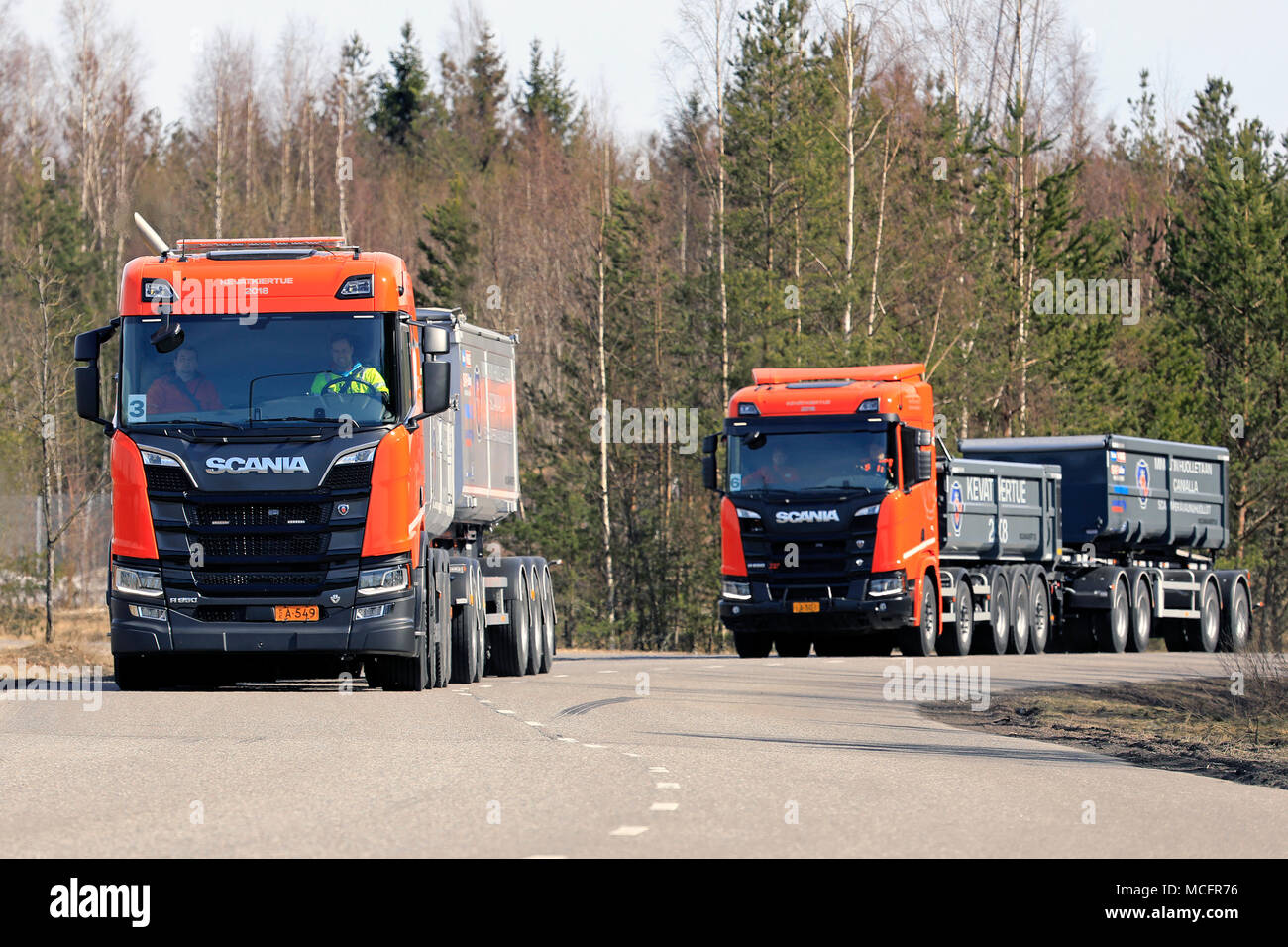 LIETO, FINLAND - APRIL 12, 2018: Two orange Scania R650 gravel trucks ...
