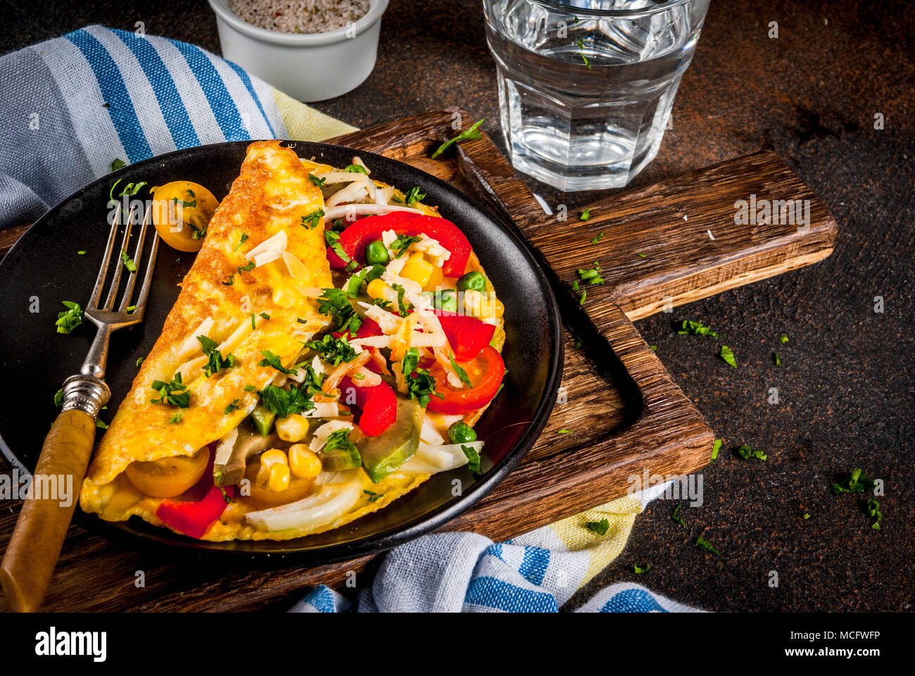 Healthy breakfast food, Stuffed egg omelette with vegetable, dark