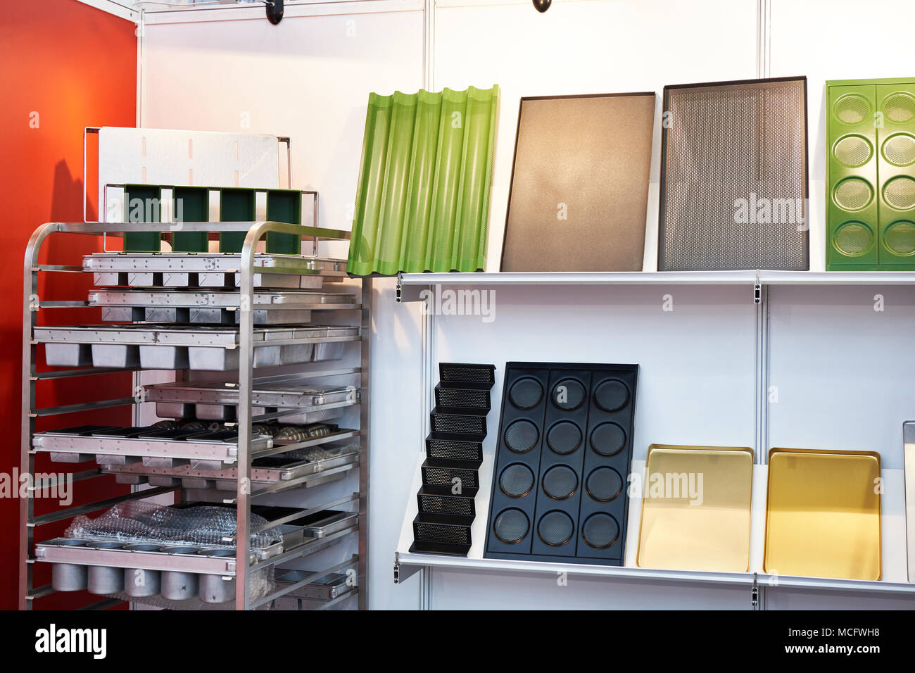 Baking tray and molds on the counter in the store Stock Photo