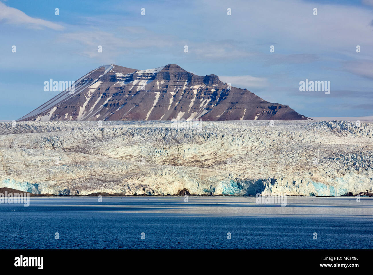 Terrierfjellet Mountain and Nordenskioldbreen glacier in Billefjorden fjord in Svalbard (Spitsbergen) Stock Photo