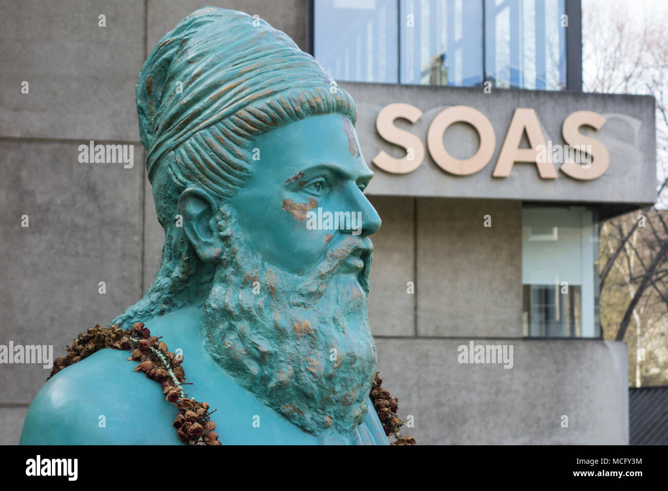 Closeup of a statue of Tamil poet Thiruvalluvar, outside The School of Oriental and African Studies (SOAS), University of London, England, UK Stock Photo