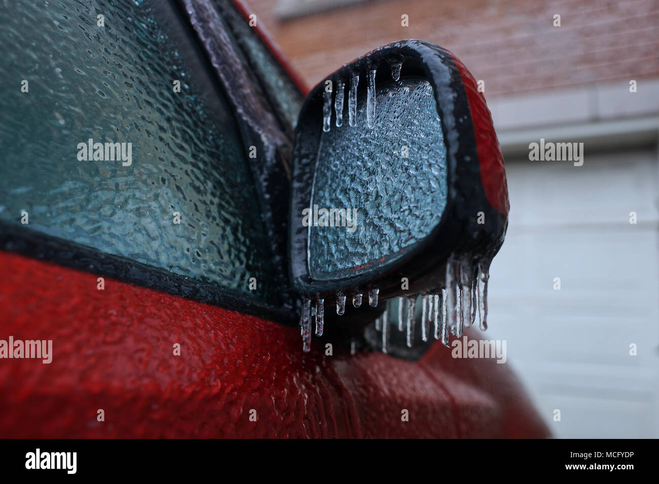 Montreal,Canada,16,April,2018.Car mirror covered with ice and sleet. Credit:Mario Beauregard/17�Թ����� Live News Stock Photo