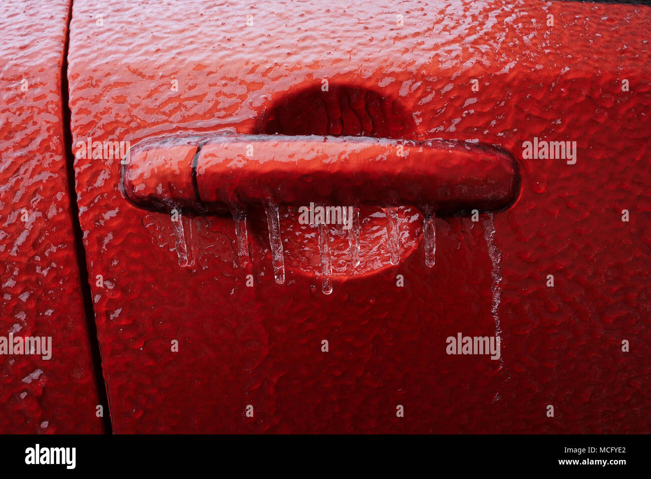 Door handle on a white car door coated with a 2-component heavy-duty  protective paint for extreme conditions, raptor paint Stock Photo - Alamy