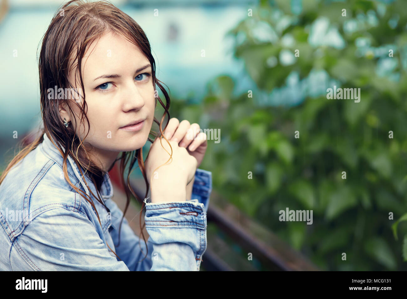 girl walking in the rain Stock Photo Alamy