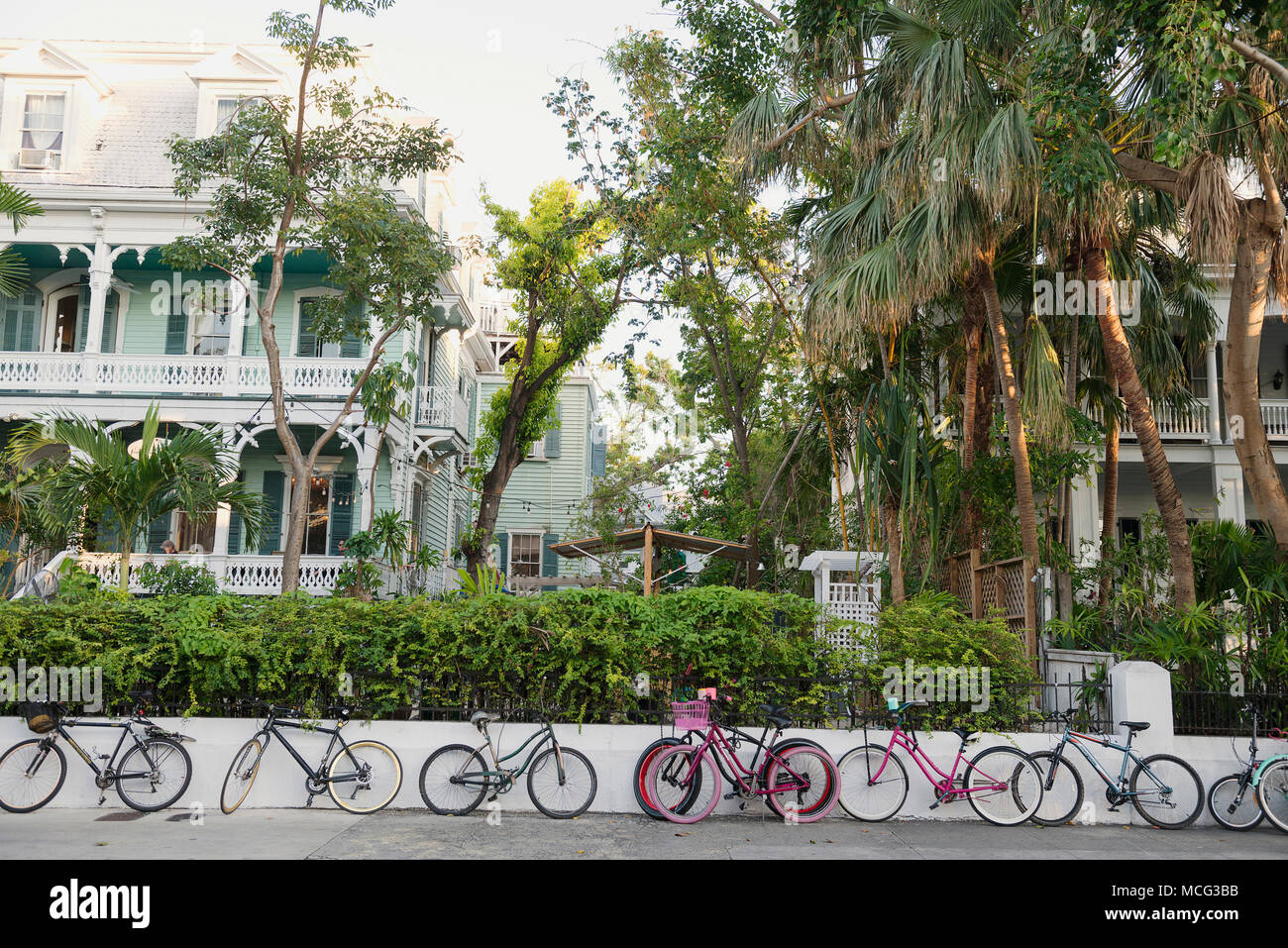 Bicycles lining a sidewalk in Key West, Florida. Stock Photo