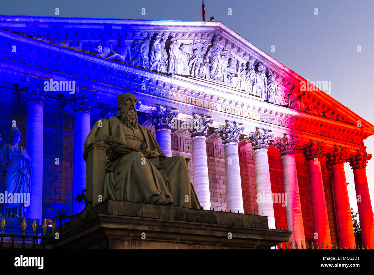The French National Assembly lit up with colors of French national flag