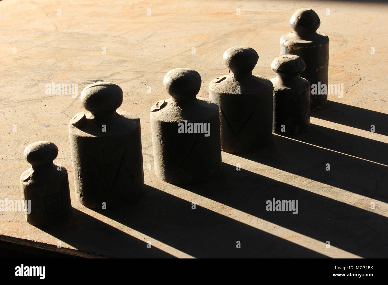Vintage iron weights Stock Photo Alamy