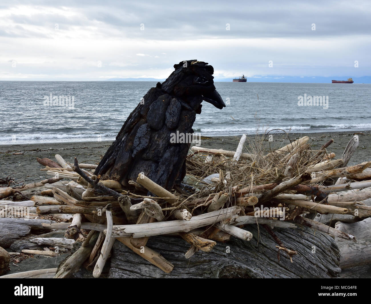 Beach art made from driftwood, rock and shells at Esquimalt Lagoon, Victoria, British Columbia, Canada Stock Photo