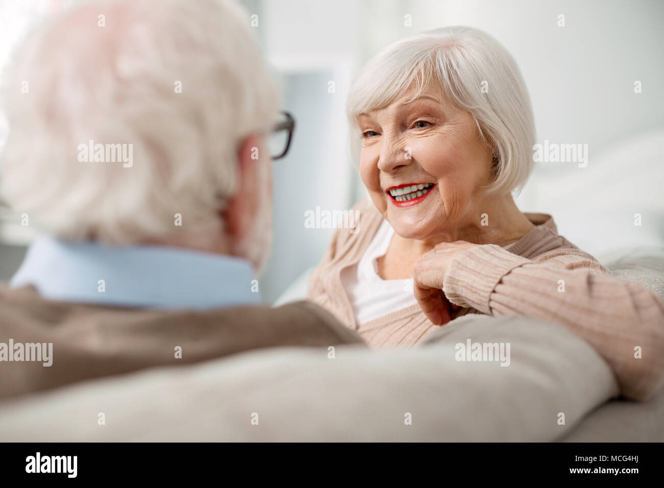 Portrait of happy elderly woman Stock Photo