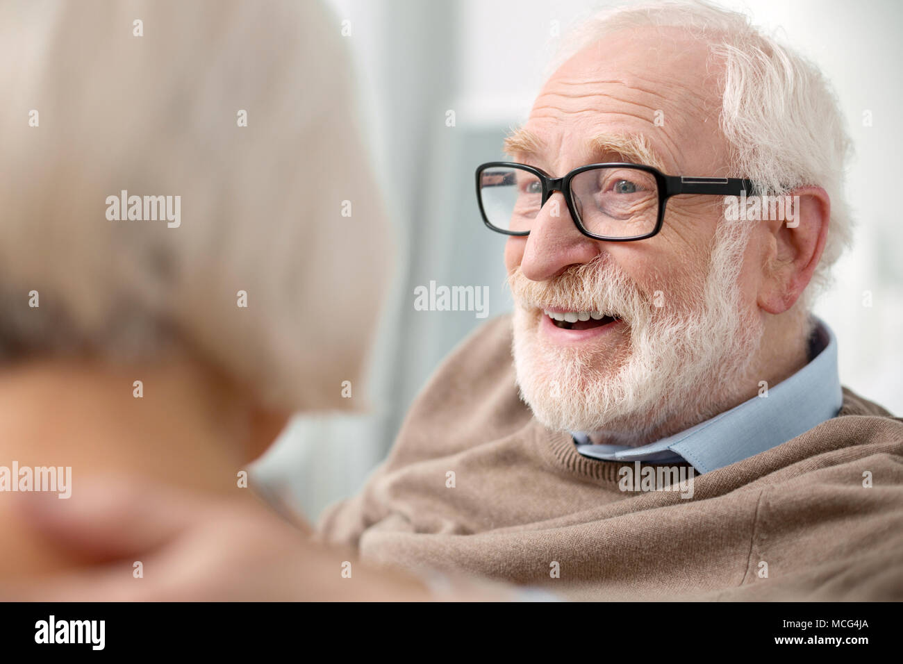 Portrait of a delighted elderly man Stock Photo