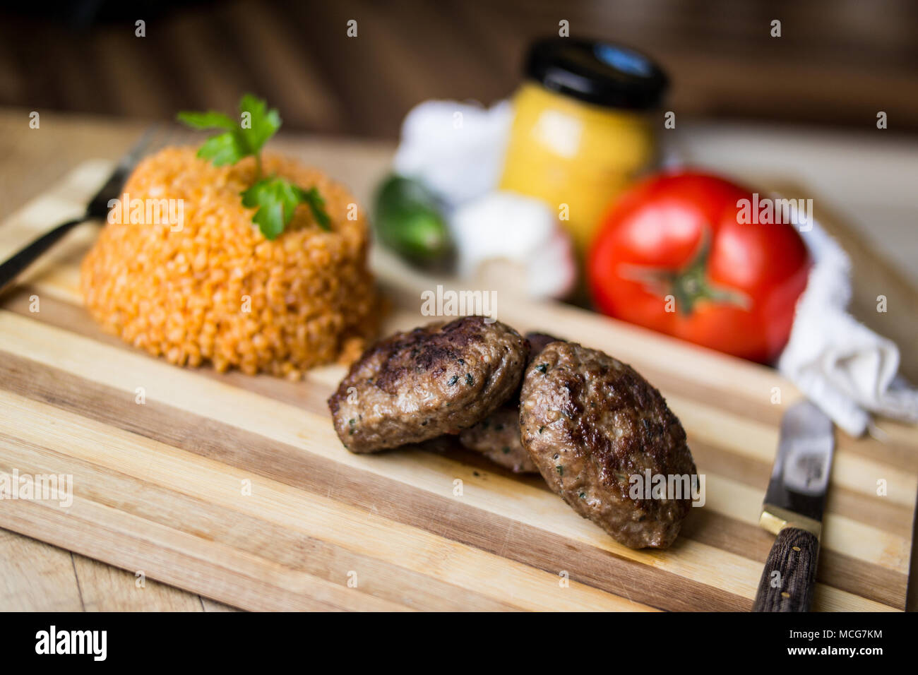 Turkish Meatball Kofte or Kofta with Pliav / Bulgur Pilaf, tomatoes and