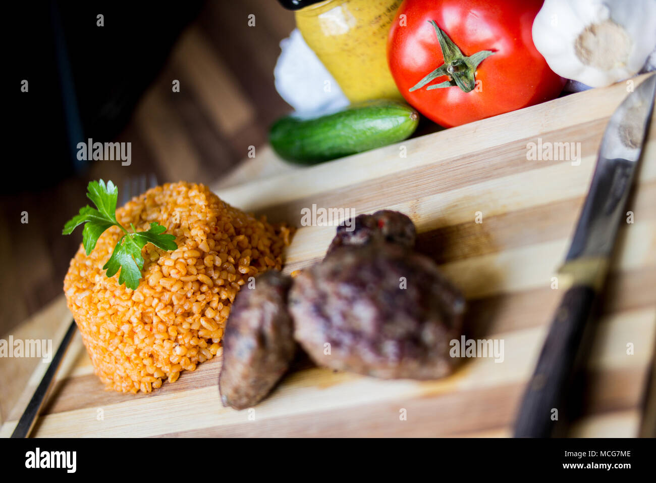 Turkish Meatball Kofte or Kofta with Pliav / Bulgur Pilaf, tomatoes and
