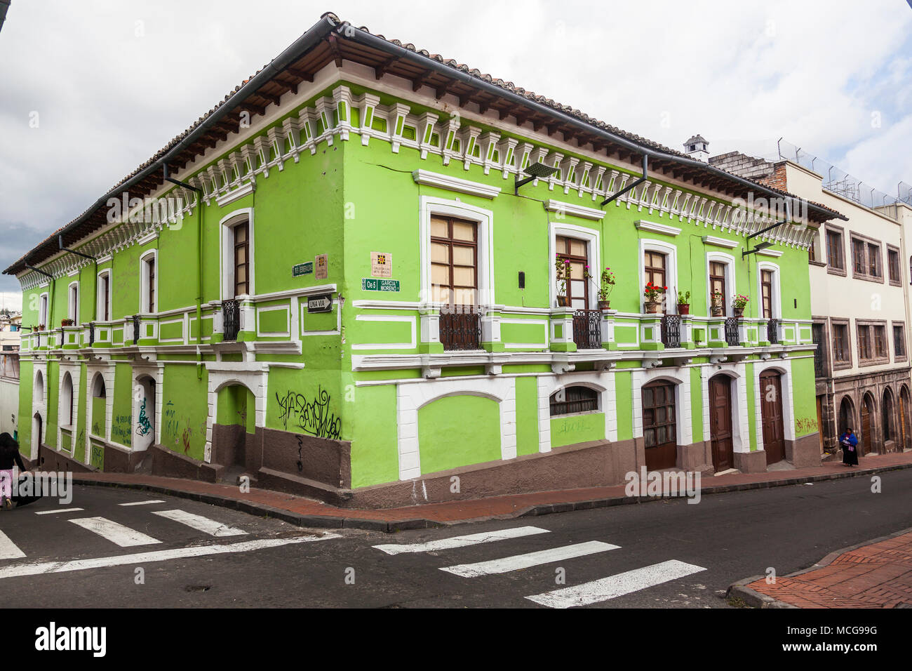 Painted green corner house in the old Quito, Ecuador Stock Photo Alamy