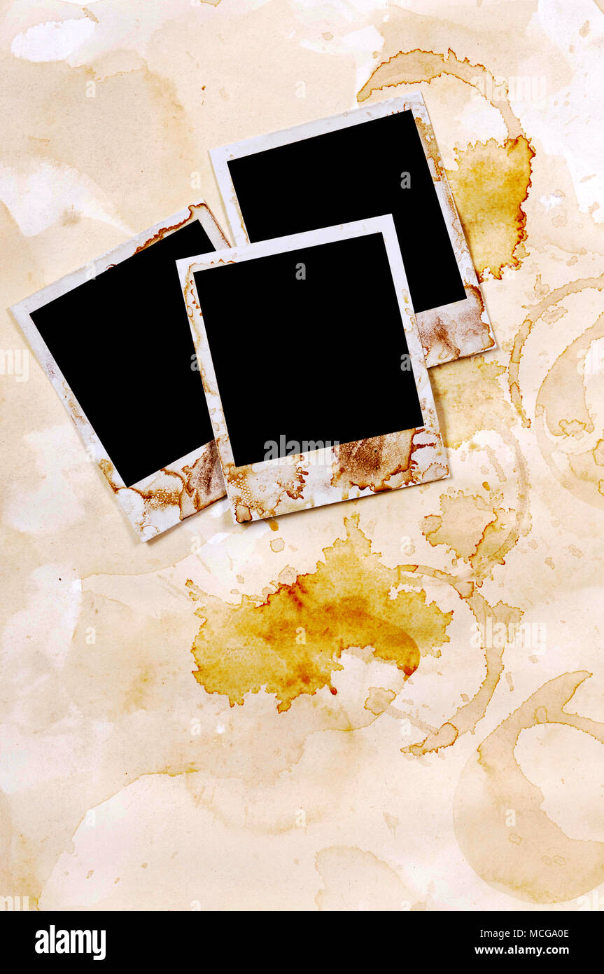 Old vintage stained polaroid style blank photo print frames on parchment  paper background Stock Photo - Alamy
