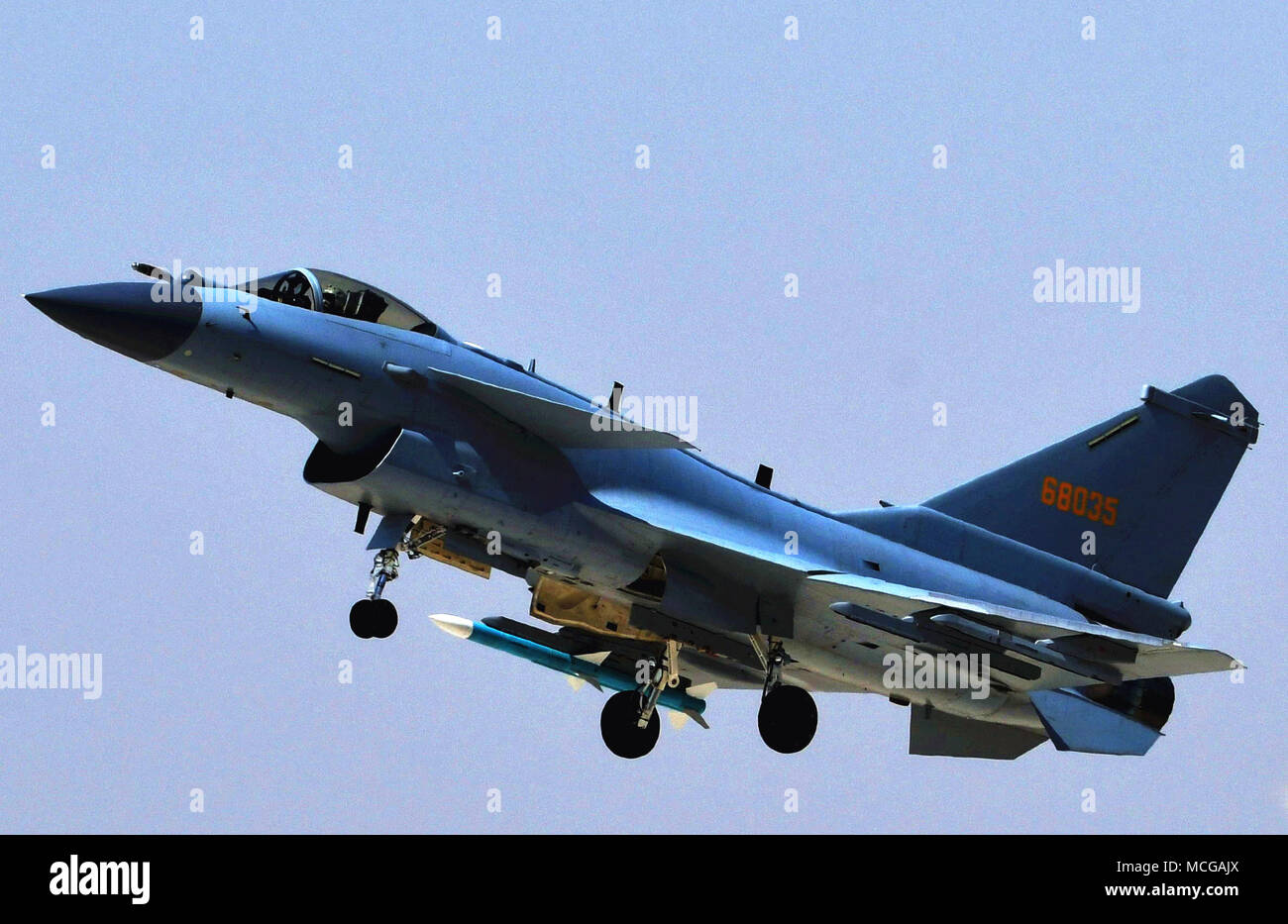 (180416) -- BEIJING, April 16, 2018 (Xinhua) -- Photo taken on April 12, 2018 shows a J-10C fighter jet in a training.  China's new multi-role fighter jet J-10C began combat duty Monday, the People's Liberation Army (PLA) air force announced.  It is China's third-generation supersonic fighter and made its debut when the PLA marked its 90th anniversary in July 2017 at Zhurihe military training base in Inner Mongolia Autonomous Region. Equipped with an advanced avionics system and various airborne weapons, the domestically-developed fighter has airstrike capabilities within medium and close rang Stock Photo