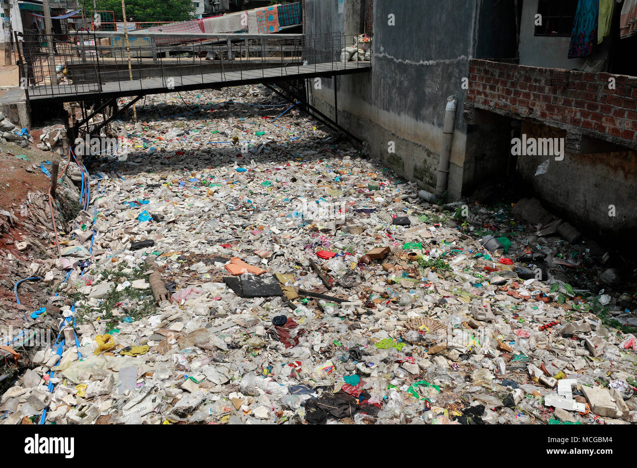 DHAKA, BANGLADESH APRIL 16, 2018 A canal full with wastage plastic