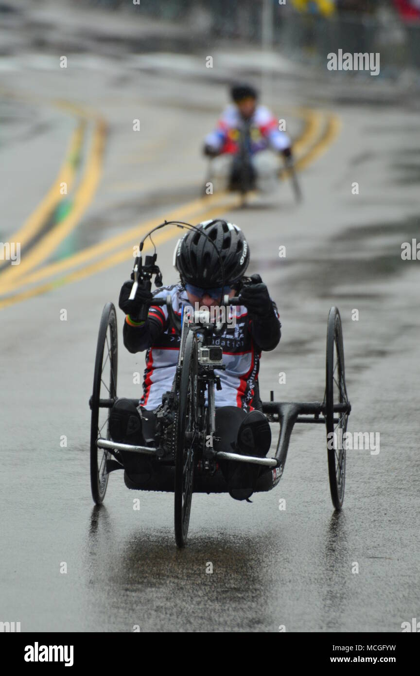 Newton, MA, USA April 16, 2018 Wheelchair racers brave the elements and Heartbreak Hill on their way to complete the Boston Marathon Credit: James Kirkikis/Alamy Live News Stock Photo