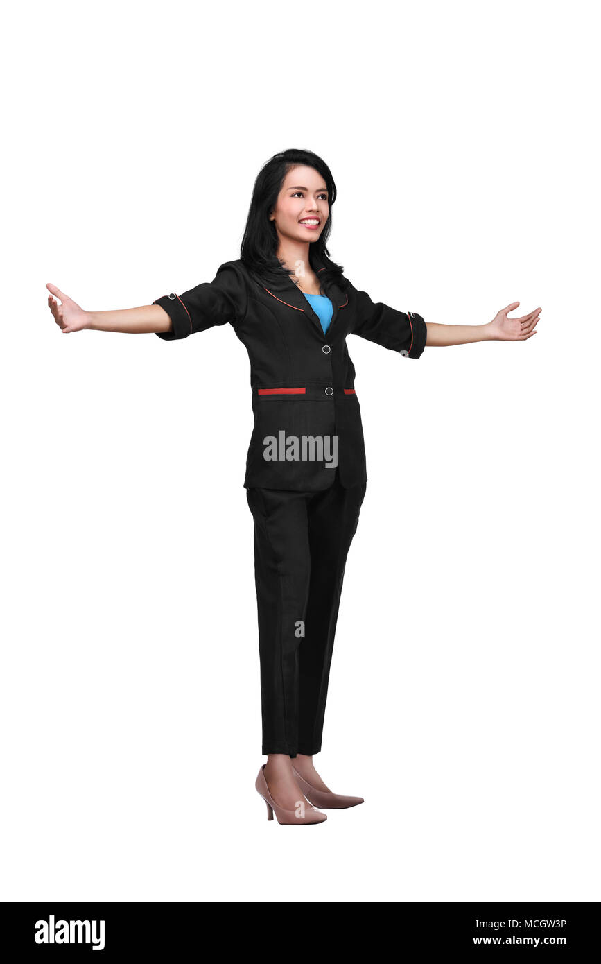 Portrait of asian business woman standing with open hand posing isolated over white background Stock Photo