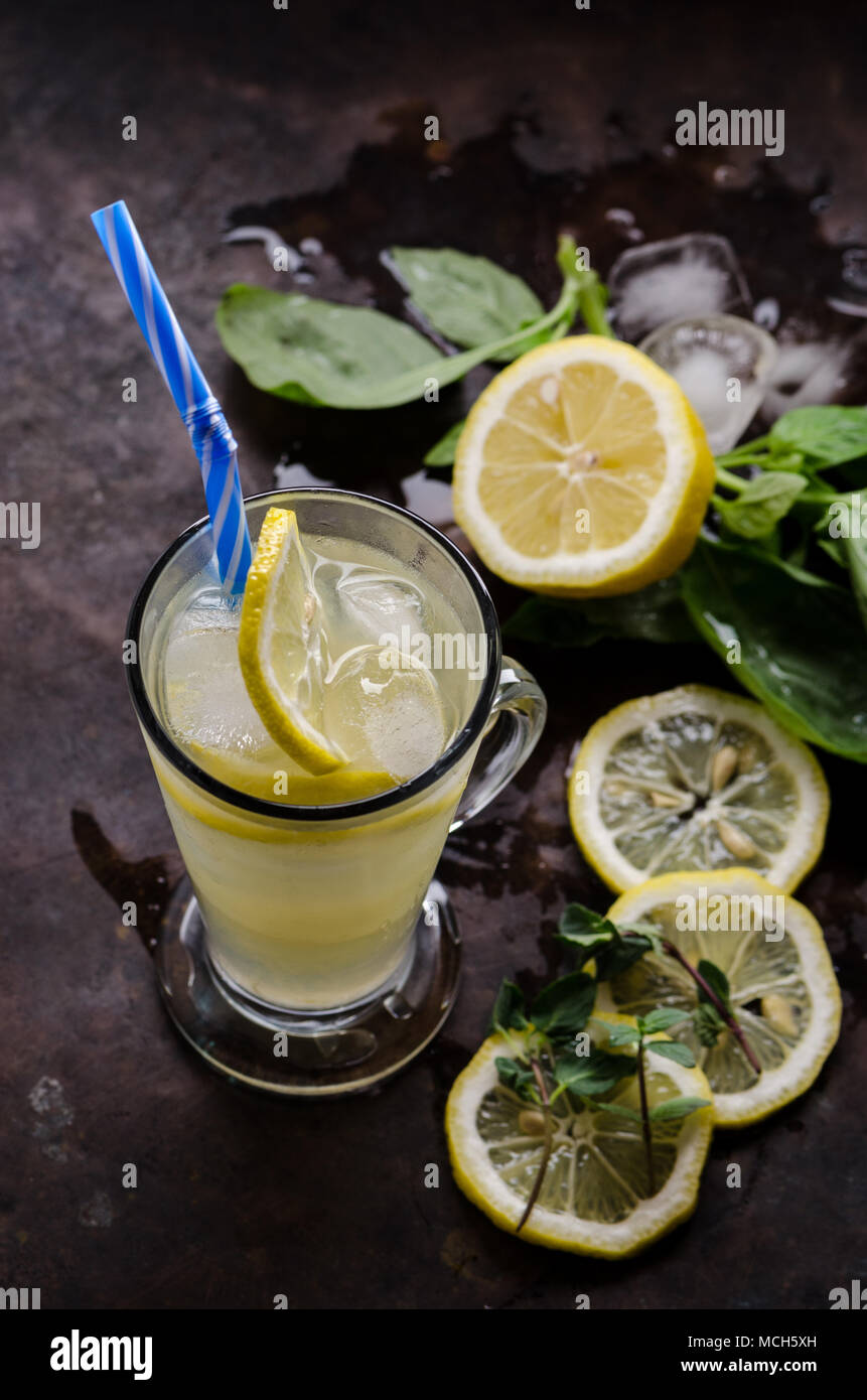 Lemonade with mint and basil on the dark background Stock Photo