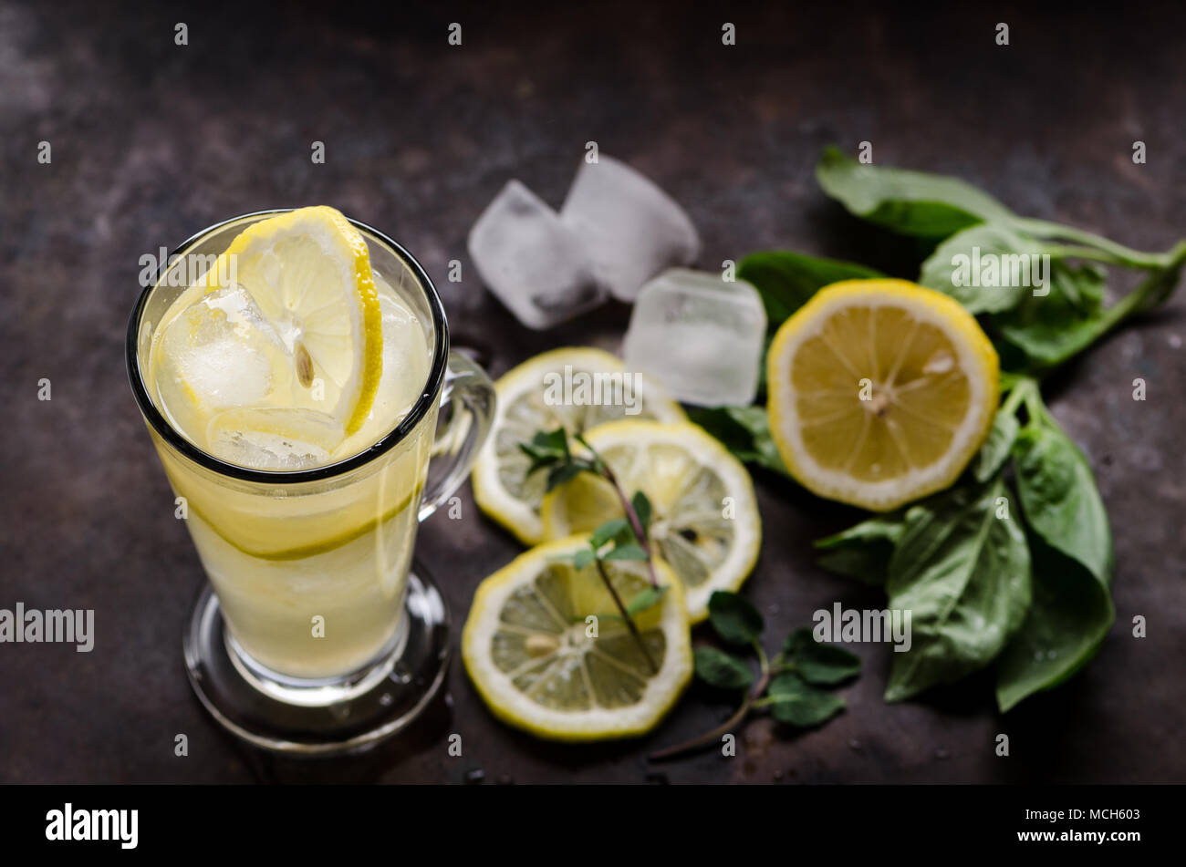 Lemonade with mint and basil on the dark background Stock Photo