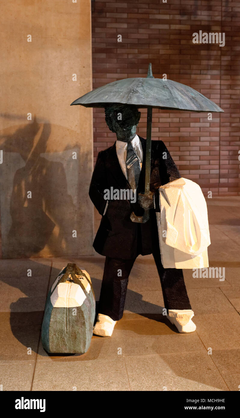 Statues on the street, blocky and surreal, Singapore business district Stock Photo