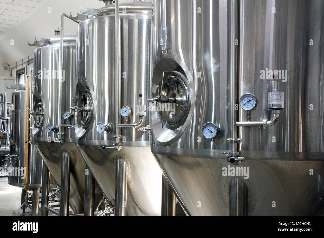 Craft Beer production. stainless steel cylindroconical fermenters at Breaker Brewing Co. Wilkes Barre TWP. PA. Anthracite Coal region of NE PA. Stock Photo