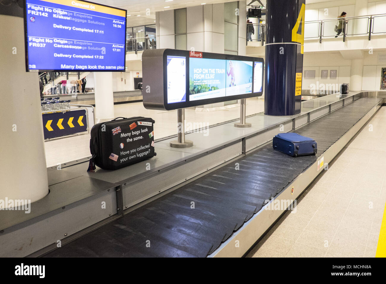 Passengers wait for luggage at manchester airport hires stock photography and images Alamy