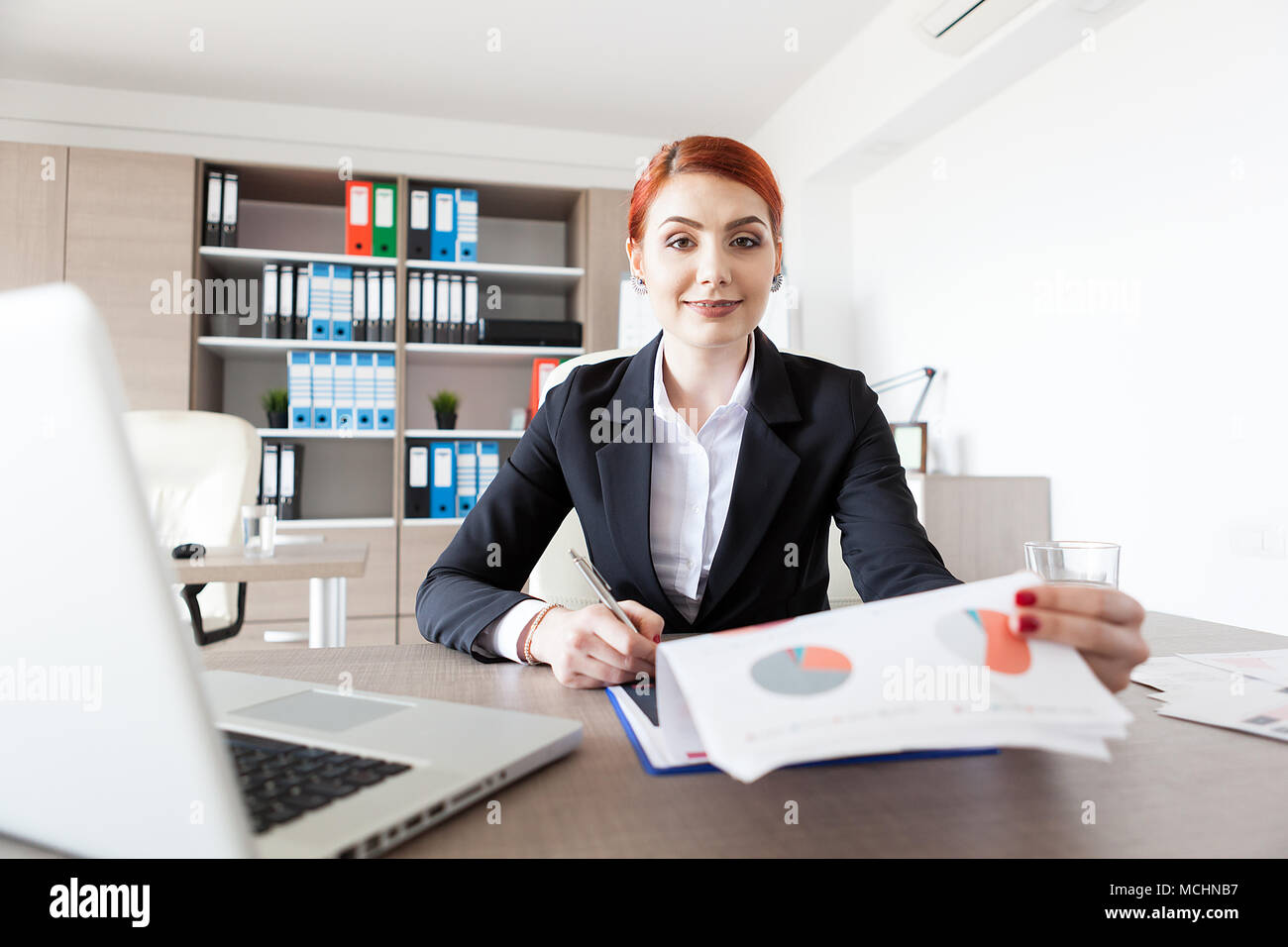Female redhead office manager hi-res stock photography and images - Alamy