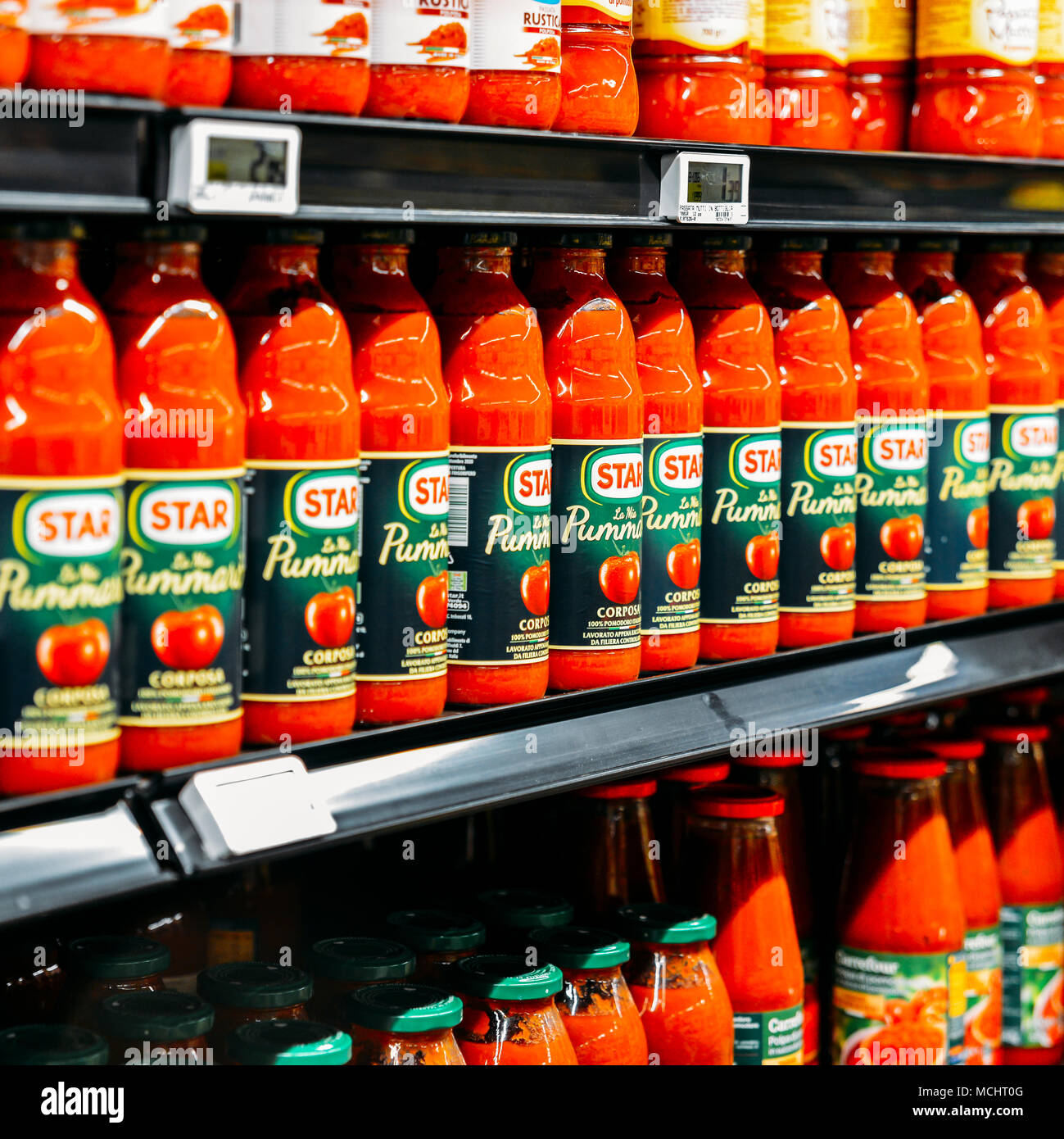 Illustrative editorial of a row of Star brand tomato sauce in a