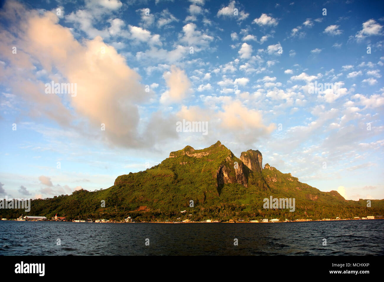 View of Mount Otemnaufrom the sea at sunset, Bora Bora, French Polynesia. Stock Photo