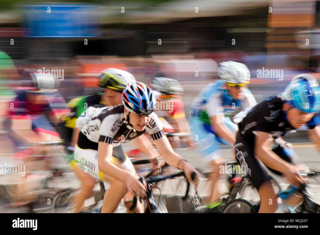 Belgrade, Serbia - April 14, 2018: Motion blur panning shot of young bicycle racers competing  in Tour of kids bicycle race for young men under 17 Stock Photo