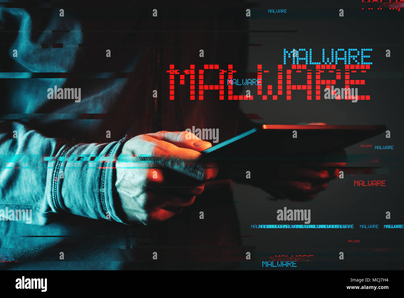 Malware concept with person using tablet computer, low key red and blue lit image and digital glitch effect Stock Photo