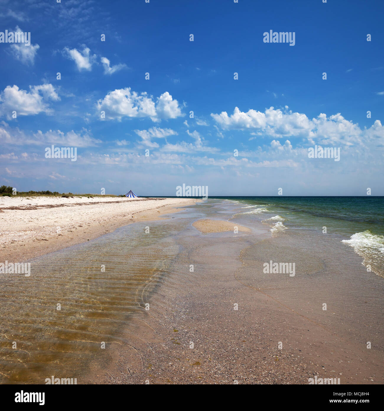 Sea with sand beach and blue sky with clouds at sun summer day Stock ...