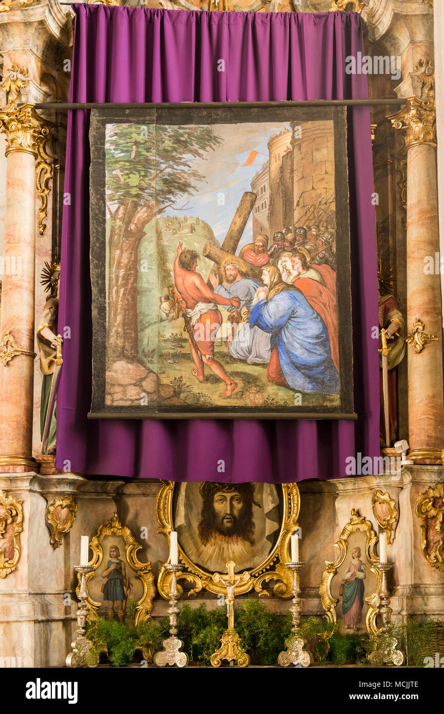 Restored Lent scarf hangs in church above altar, veiled pictorial representations during Lenting season, Flintsbach, Bavaria Stock Photo