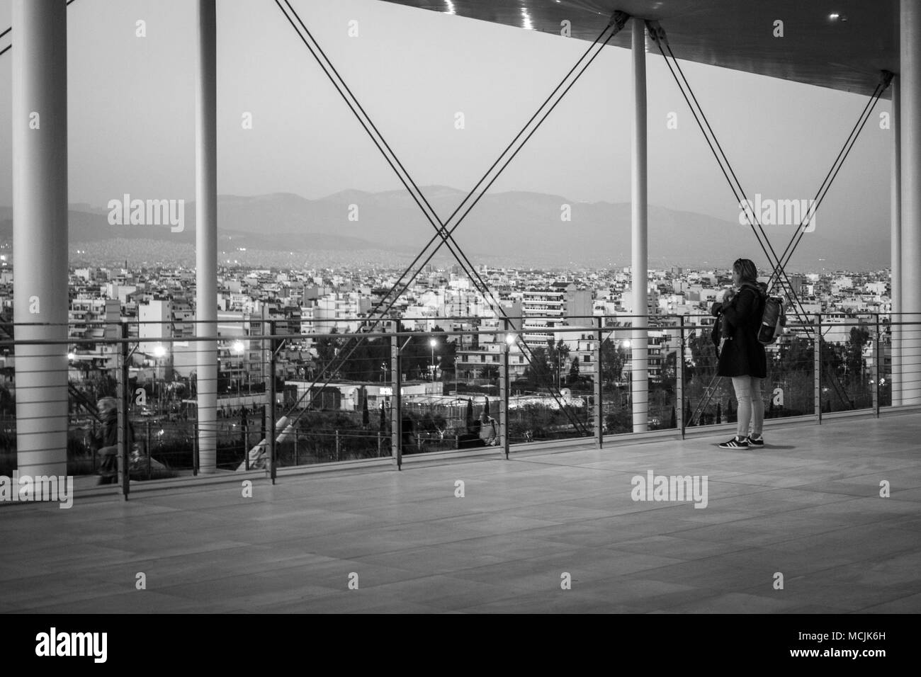 Side view of woman at Stavros Niarchos Foundation Cultural Center, Athens, Greece Stock Photo