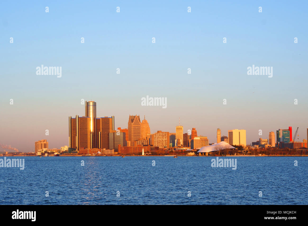 Downtown Detroit view from BelleIsle during sunrise with view on