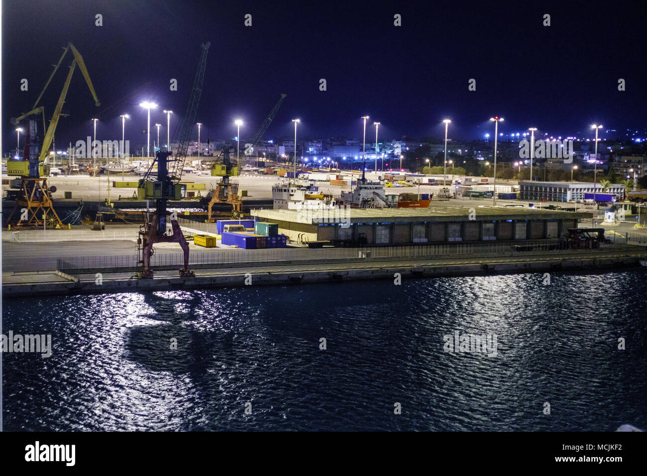 High angle view of commercial dock at night, Athens, Greece Stock Photo