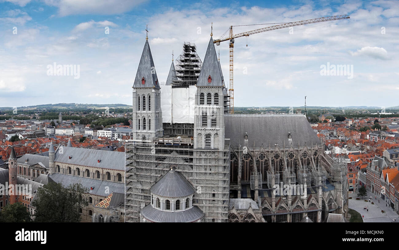Under construction church and city buildings in Tournai, Belgium Stock Photo