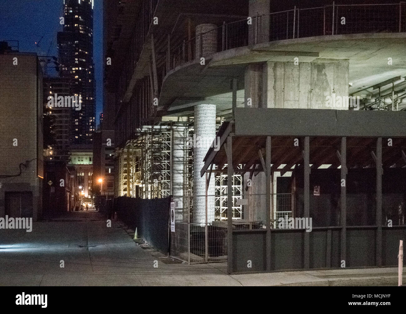 Construction site and modern building at night, Toronto, Canada Stock Photo