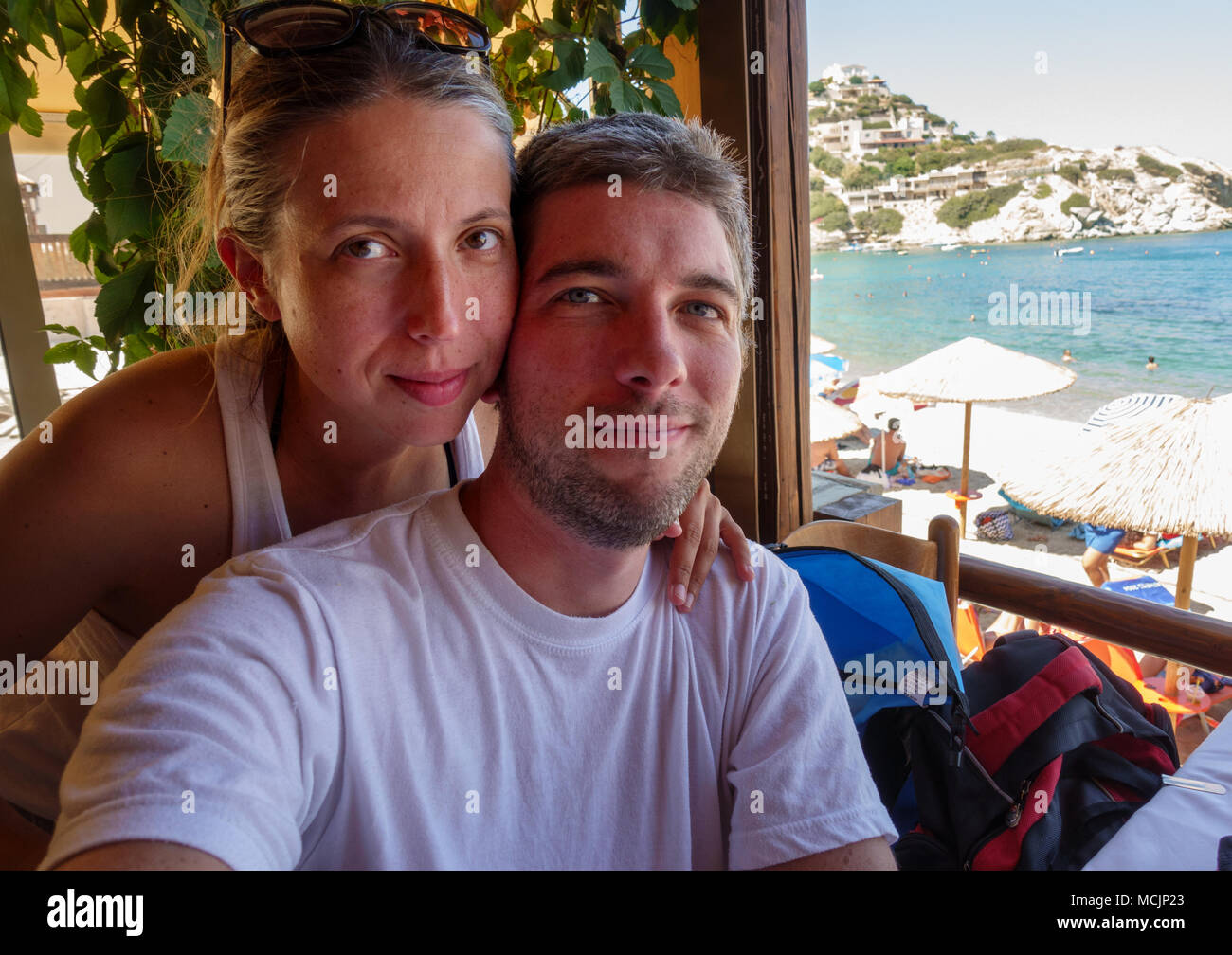 Portrait of happy young couple at beach resort, Heraklion, Greece Stock Photo