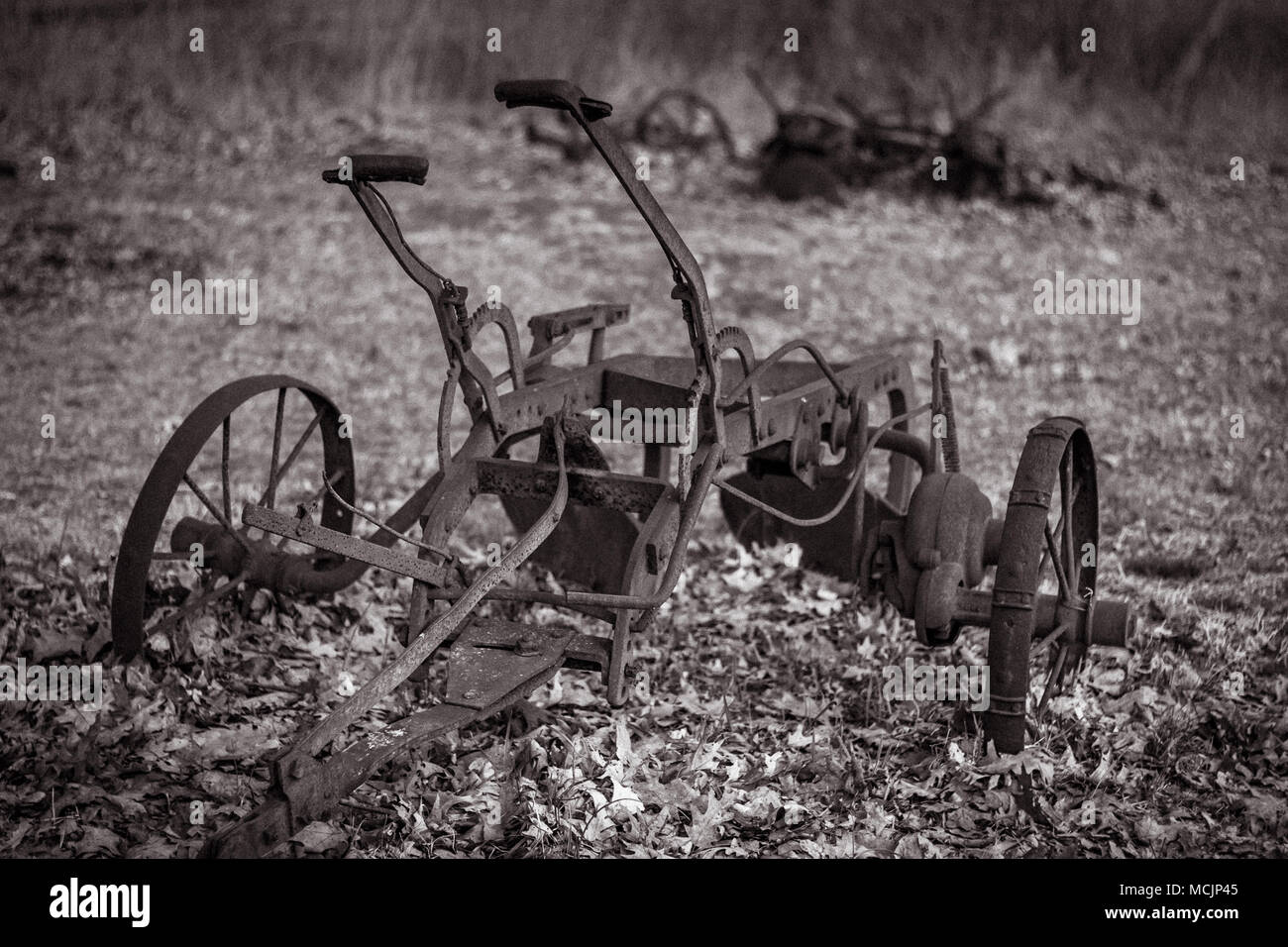 Rusty File Farm old rusty farm machinery Stock Photo - Alamy