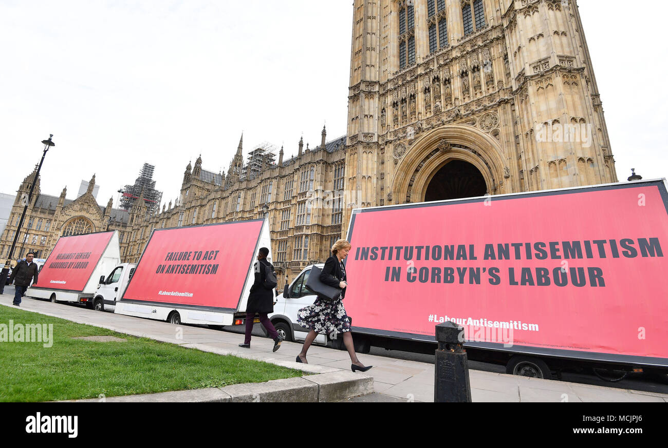 A convoy of three billboard advertising vans with an anti-semitism message  for Jeremy Corbyn and the Labour party, pass by the Houses or Parliament in  London Stock Photo - Alamy