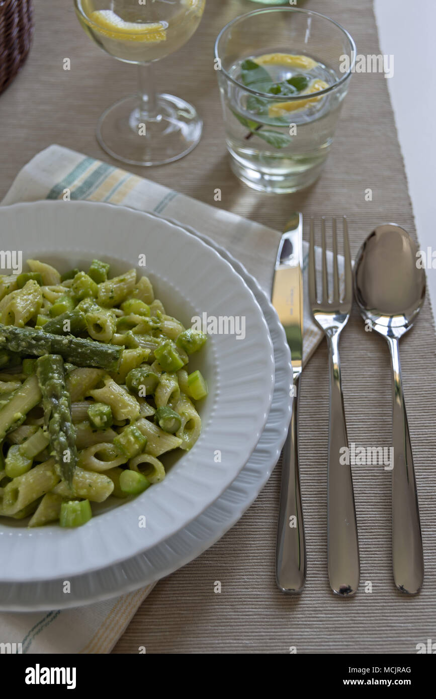 short pasta dish with asparagus and asparagus cream 6 Stock Photo