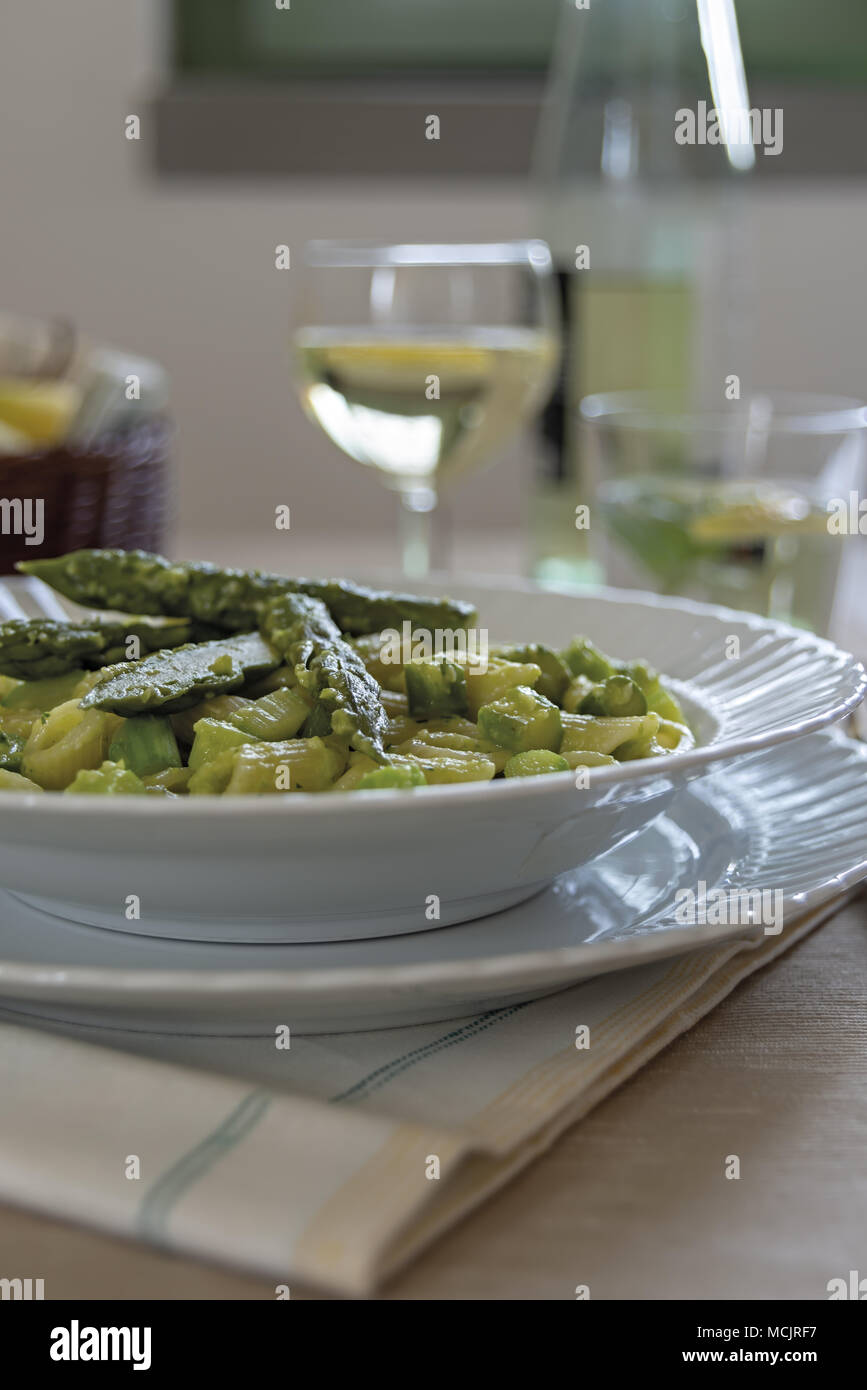 short pasta dish with asparagus and asparagus cream 11 Stock Photo