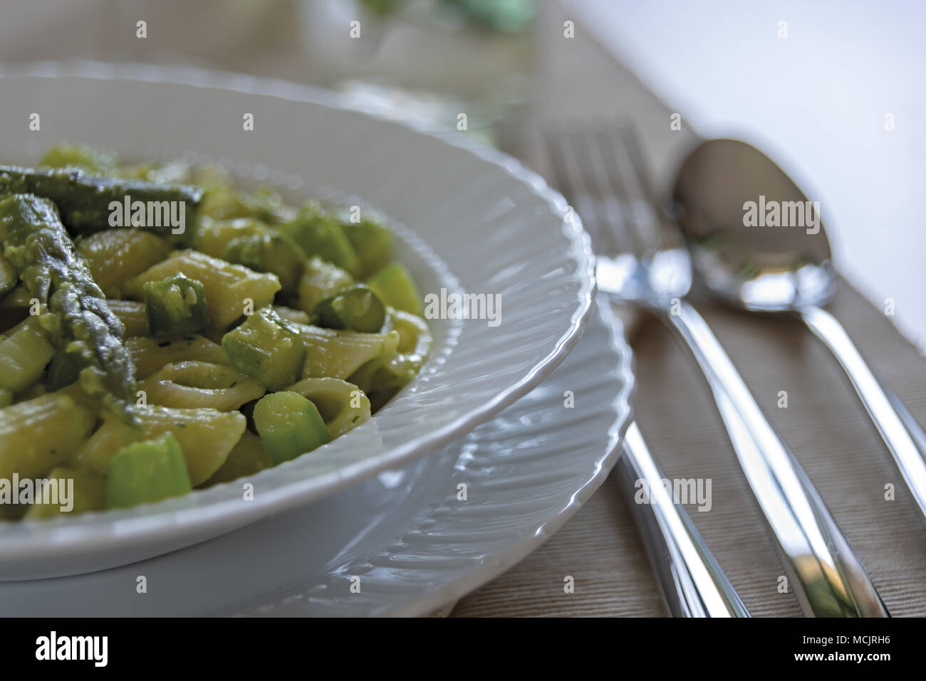 short pasta dish with asparagus and asparagus cream 14 Stock Photo